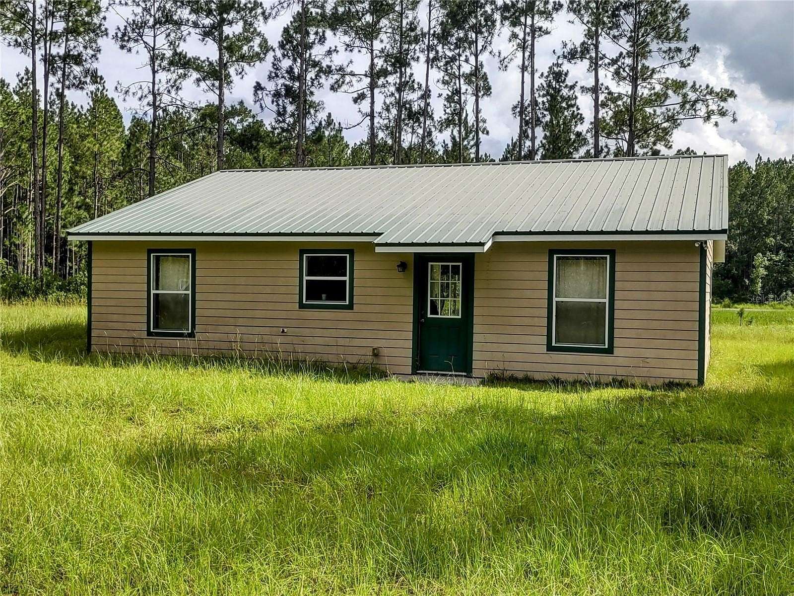 50 Acres of Recreational Land with Home for Sale in Chiefland, Florida