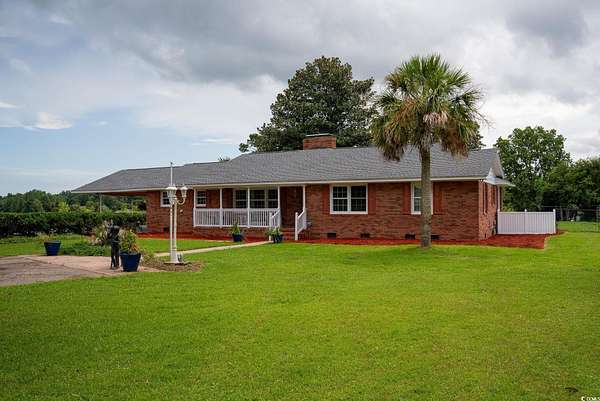 3.28 Acres of Residential Land with Home for Sale in Loris, South Carolina