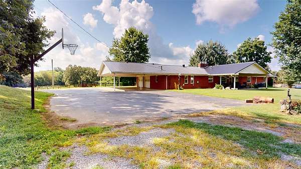 31 Acres of Land with Home for Sale in Scottsville, Kentucky