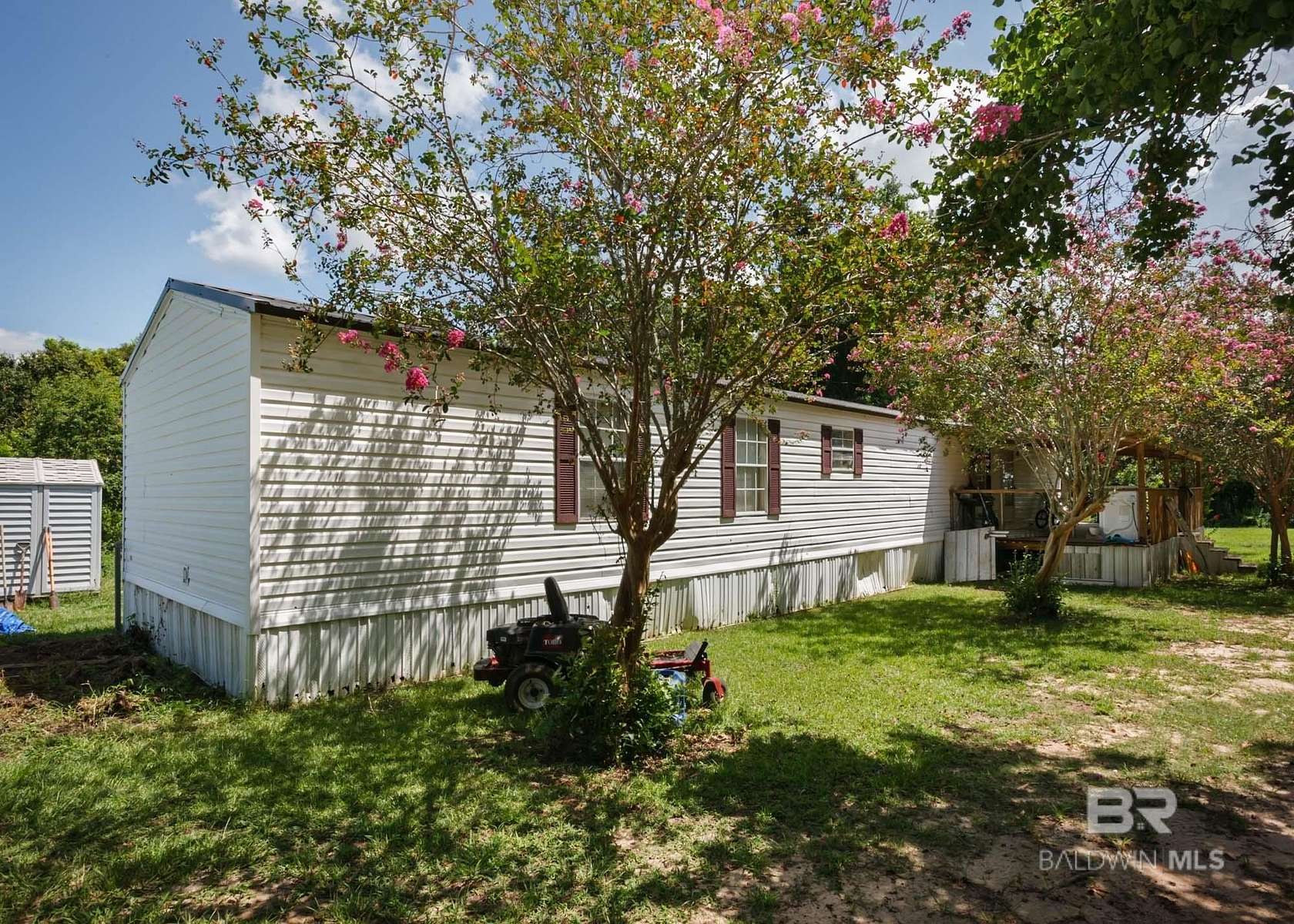 3.9 Acres of Residential Land with Home for Sale in Summerdale, Alabama