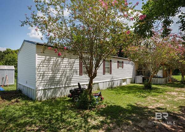 3.9 Acres of Residential Land with Home for Sale in Summerdale, Alabama