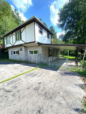 0.5 Acres of Residential Land with Home for Sale in Lackey, Kentucky