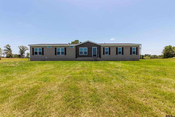 17.1 Acres of Land with Home for Sale in Gilmer, Texas