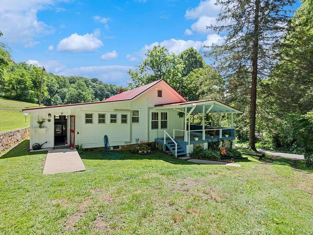 7.58 Acres of Land with Home for Sale in Sylva, North Carolina