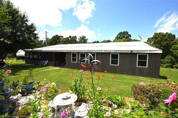 10 Acres of Land with Home for Sale in Stilwell, Oklahoma