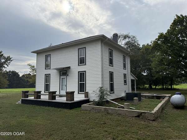 10 Acres of Land with Home for Sale in Asbury, Missouri