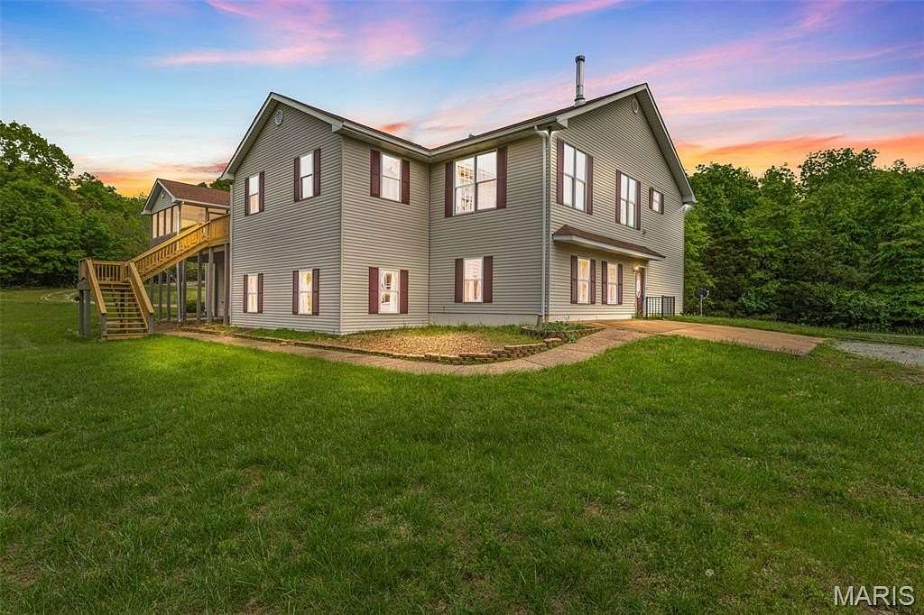 75 Acres of Land with Home for Sale in Farmington, Missouri