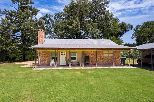 15.3 Acres of Land with Home for Sale in Scroggins, Texas