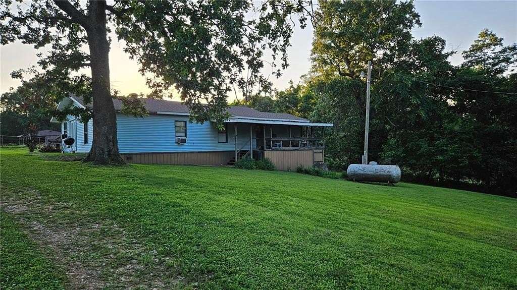 3 Acres of Residential Land with Home for Sale in Gravette, Arkansas