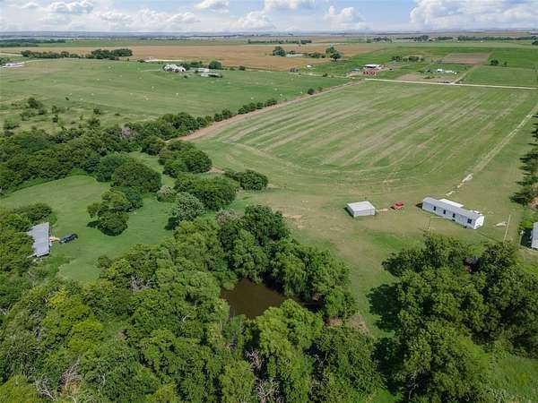 22 Acres of Land with Home for Sale in Covington, Texas