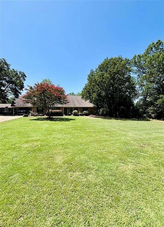 2 Acres of Residential Land with Home for Sale in Paris, Texas