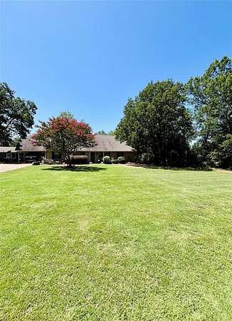 2 Acres of Residential Land with Home for Sale in Paris, Texas