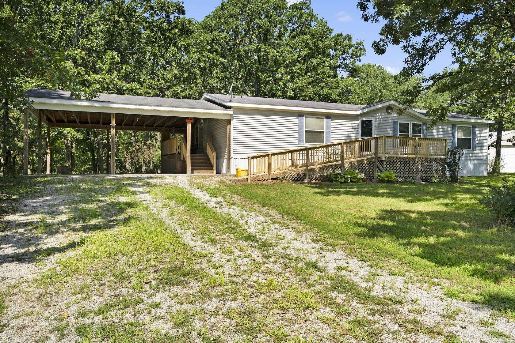 19.7 Acres of Recreational Land with Home for Sale in Buffalo, Missouri