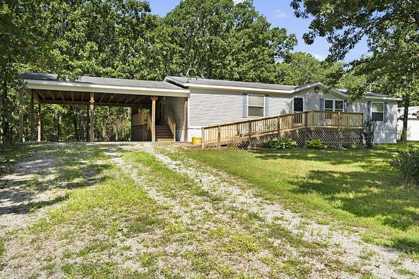 19.7 Acres of Recreational Land with Home for Sale in Buffalo, Missouri