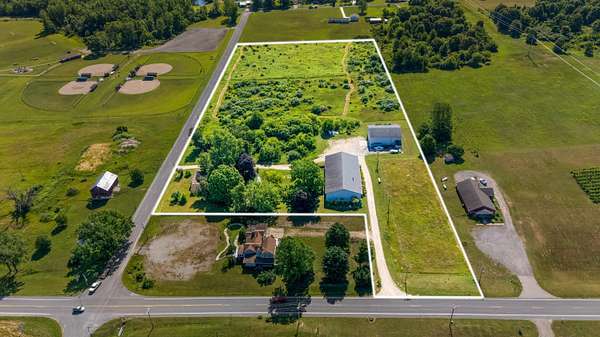 11.4 Acres of Improved Commercial Land for Sale in Coloma, Michigan