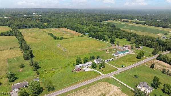 11.7 Acres of Land with Home for Auction in Middlefield, Ohio