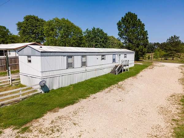 3 Acres of Residential Land with Home for Sale in Zavalla, Texas