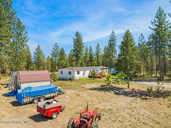 5 Acres of Residential Land with Home for Sale in Spirit Lake, Idaho