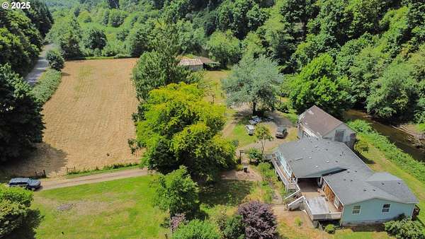 5.3 Acres of Land with Home for Sale in Eddyville, Oregon