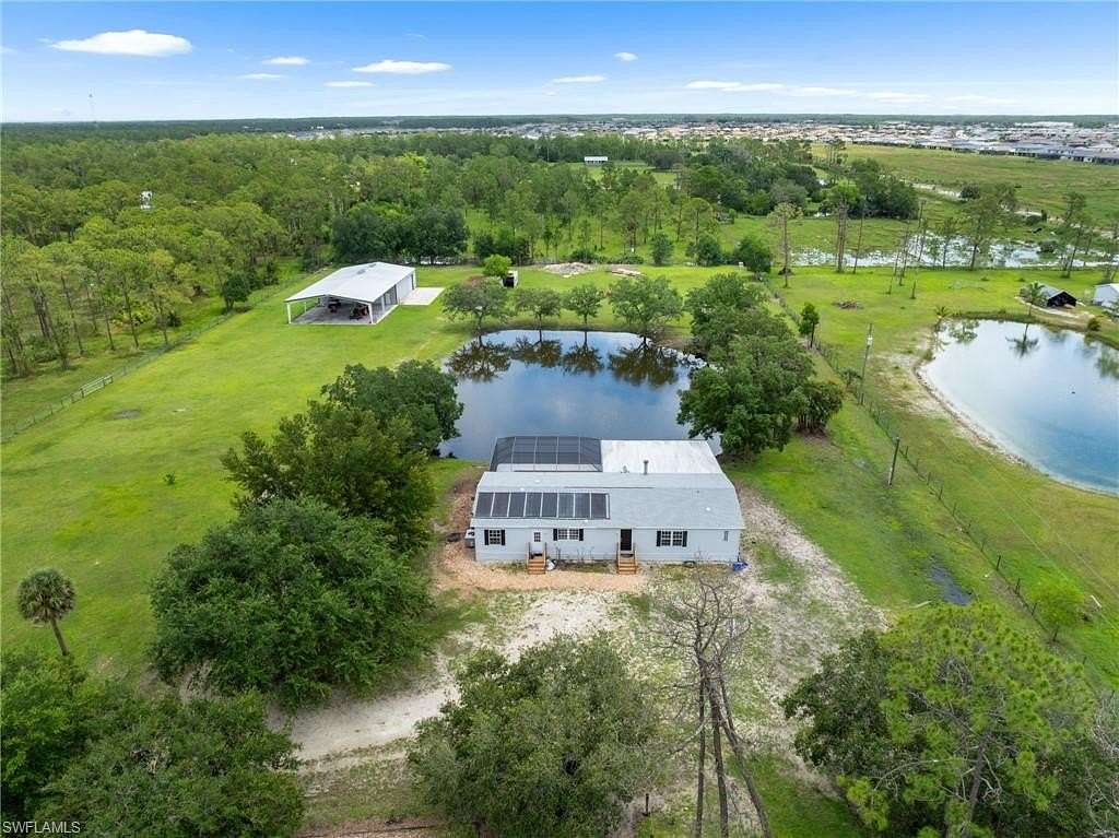 5 Acres of Residential Land with Home for Sale in Estero, Florida