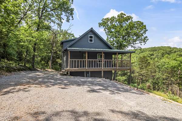 5.7 Acres of Residential Land with Home for Sale in Golden, Missouri