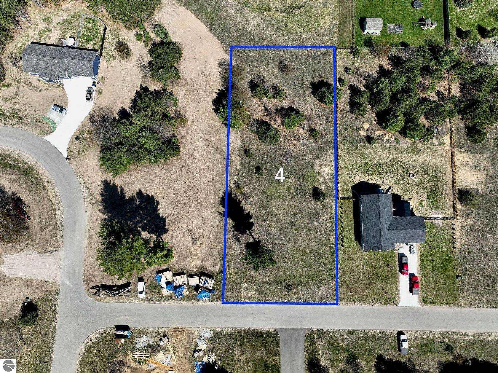 0.69 Acres of Residential Land for Sale in Grawn, Michigan