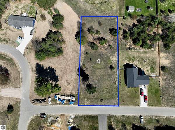 0.69 Acres of Residential Land for Sale in Grawn, Michigan