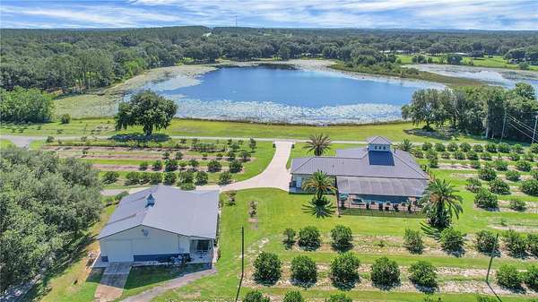 13.7 Acres of Land with Home for Sale in Weirsdale, Florida