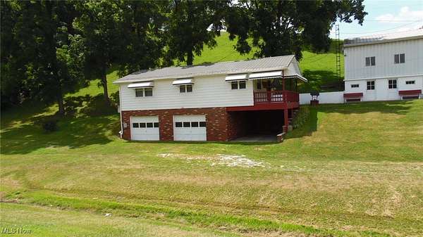 1.7 Acres of Residential Land with Home for Sale in Coshocton, Ohio