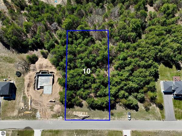 0.69 Acres of Residential Land for Sale in Grawn, Michigan