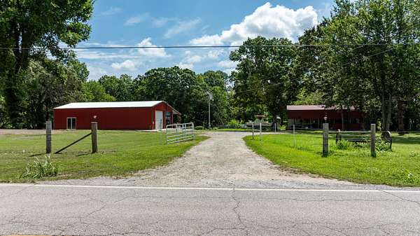 40 Acres of Agricultural Land with Home for Sale in Eucha, Oklahoma