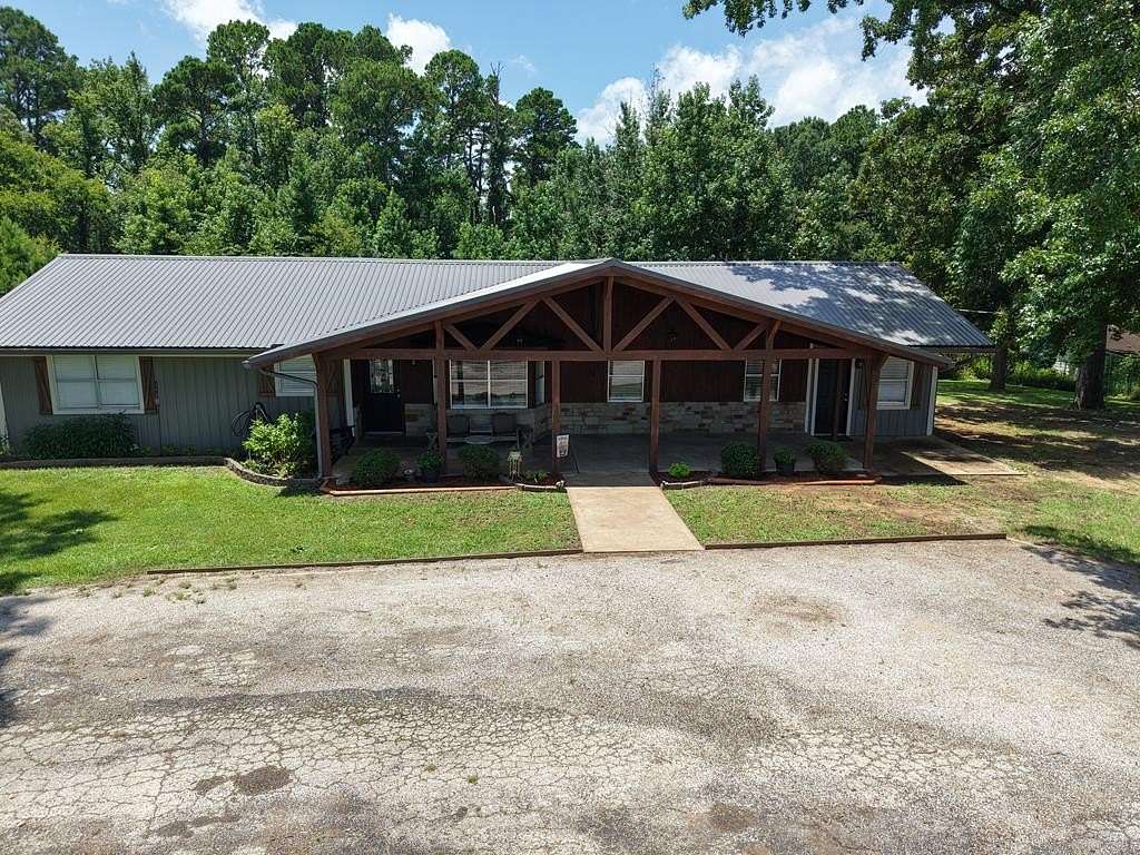 4.45 Acres of Residential Land with Home for Sale in Elkhart, Texas