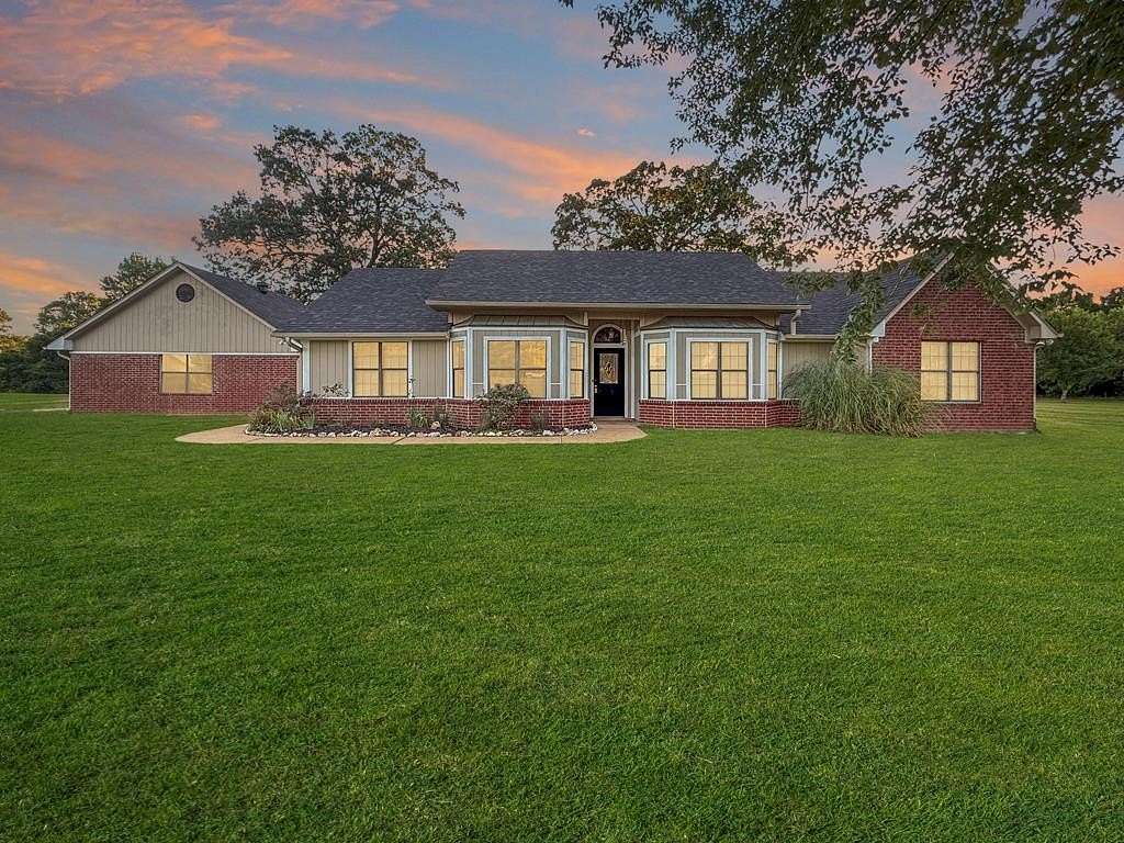 2.3 Acres of Residential Land with Home for Sale in Wake Village, Texas