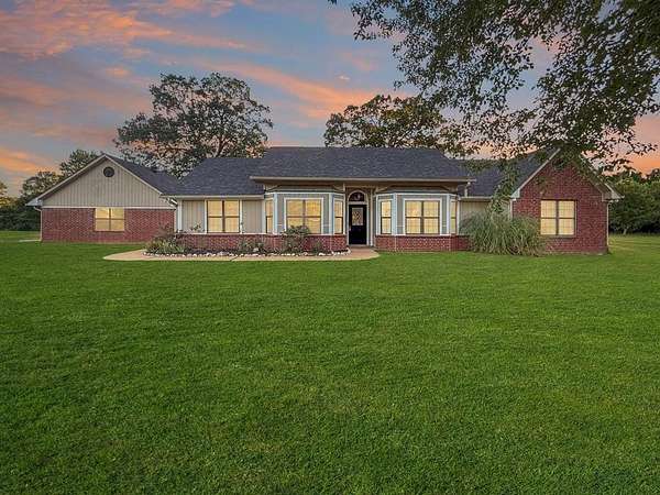 2.3 Acres of Residential Land with Home for Sale in Wake Village, Texas