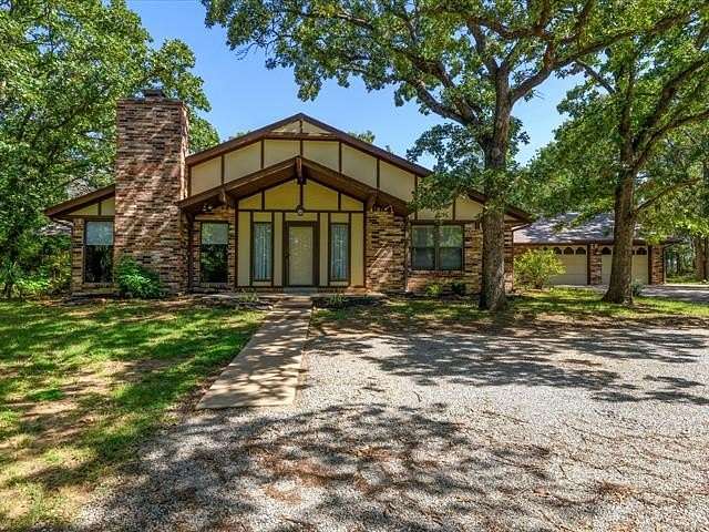 4.2 Acres of Residential Land with Home for Sale in Bartlesville, Oklahoma