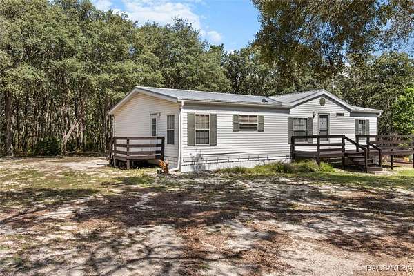 5 Acres of Residential Land with Home for Sale in Lecanto, Florida