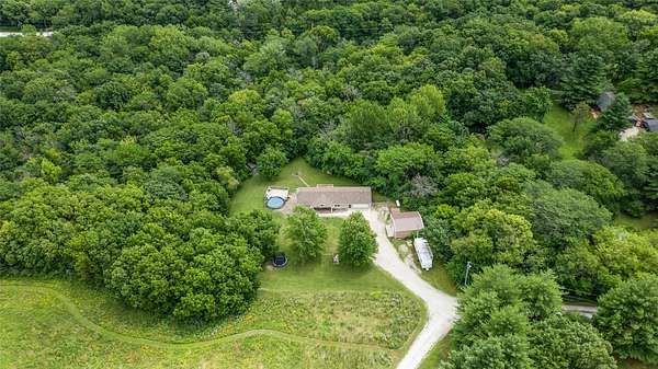 9 Acres of Residential Land with Home for Sale in Carlisle, Iowa
