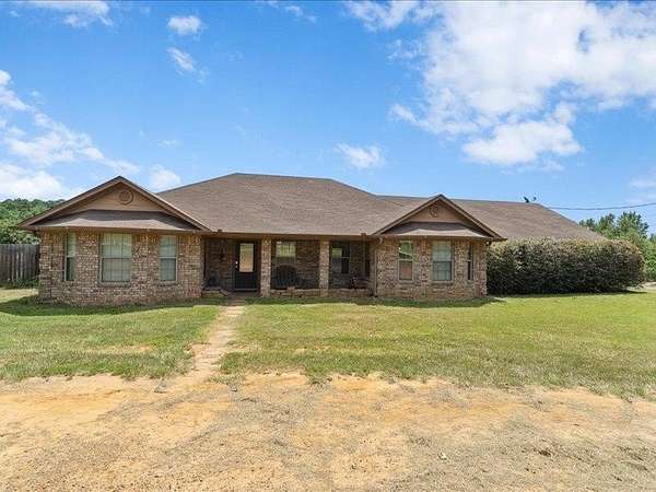 2.78 Acres of Land with Home for Sale in Hughes Springs, Texas
