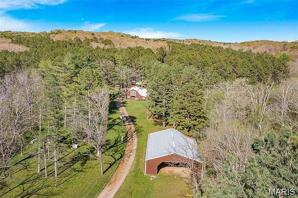 114 Acres of Land with Home for Sale in Silva, Missouri
