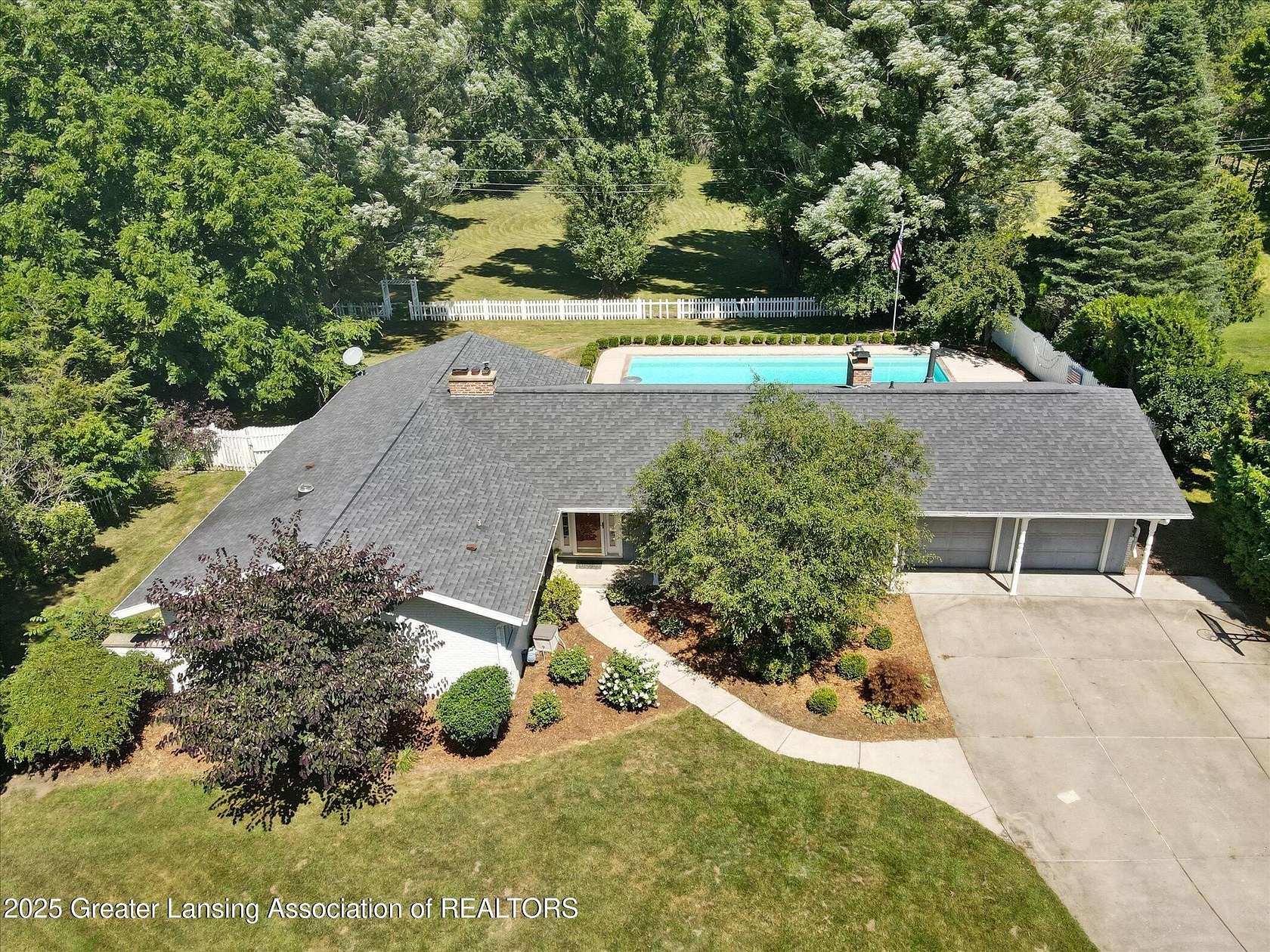 1.55 Acres of Residential Land with Home for Sale in Okemos, Michigan