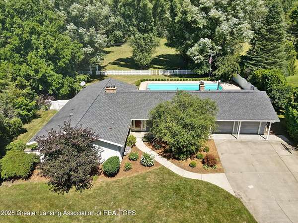 1.55 Acres of Residential Land with Home for Sale in Okemos, Michigan