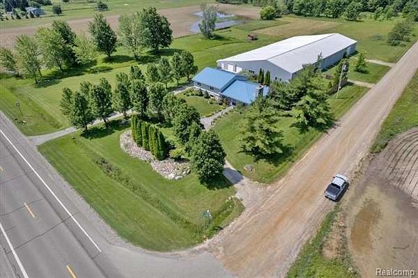 11.9 Acres of Land with Home for Sale in Fostoria, Michigan