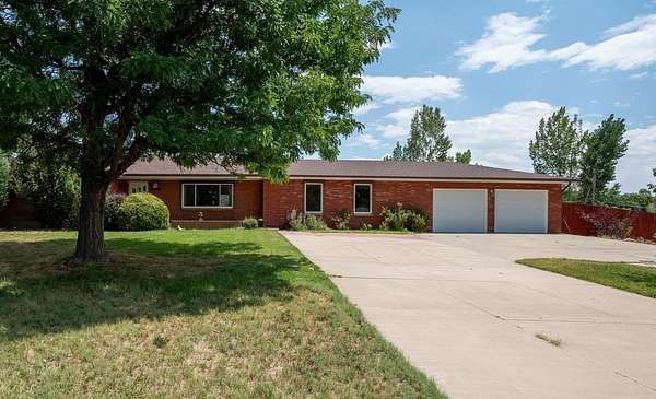 2 Acres of Residential Land with Home for Sale in Grand Junction, Colorado