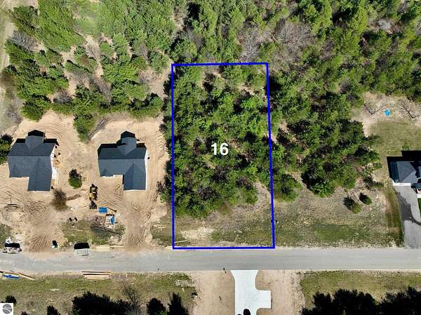 0.69 Acres of Residential Land for Sale in Grawn, Michigan