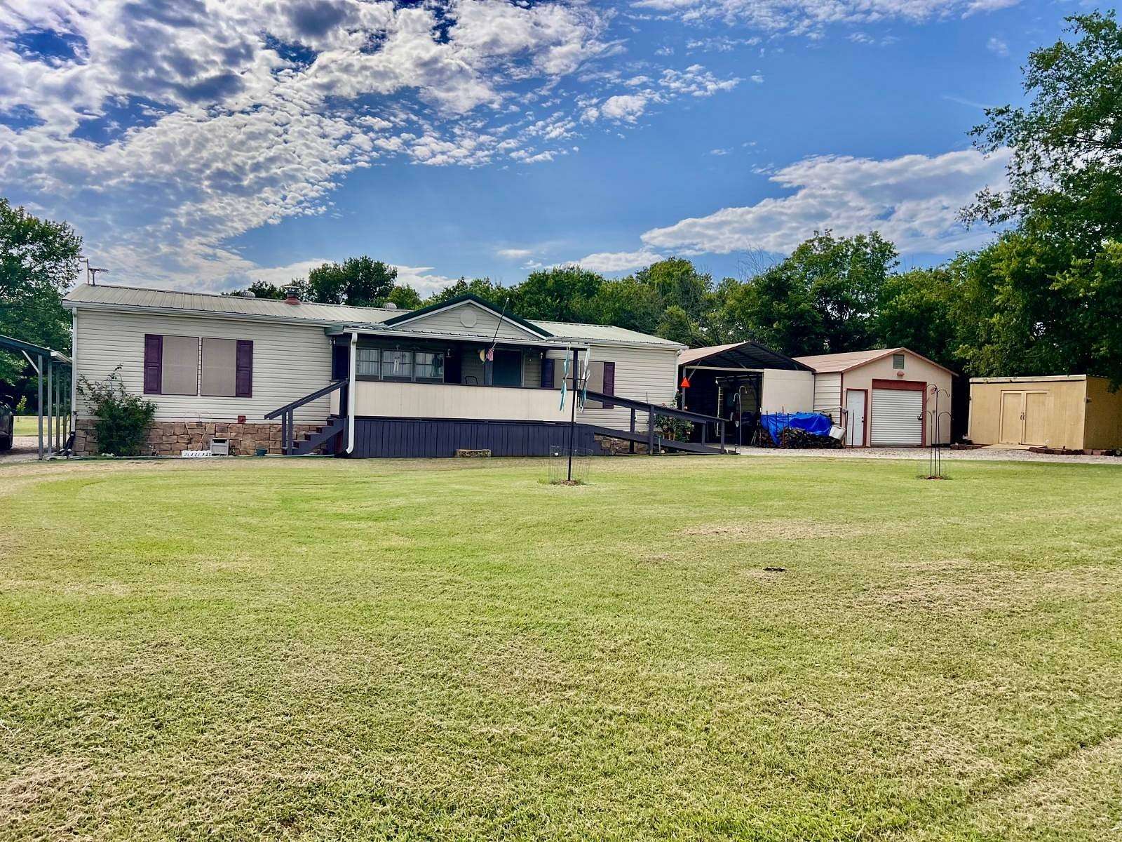 4.2 Acres of Residential Land with Home for Sale in South Coffeyville, Oklahoma