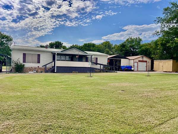 4.2 Acres of Residential Land with Home for Sale in South Coffeyville, Oklahoma