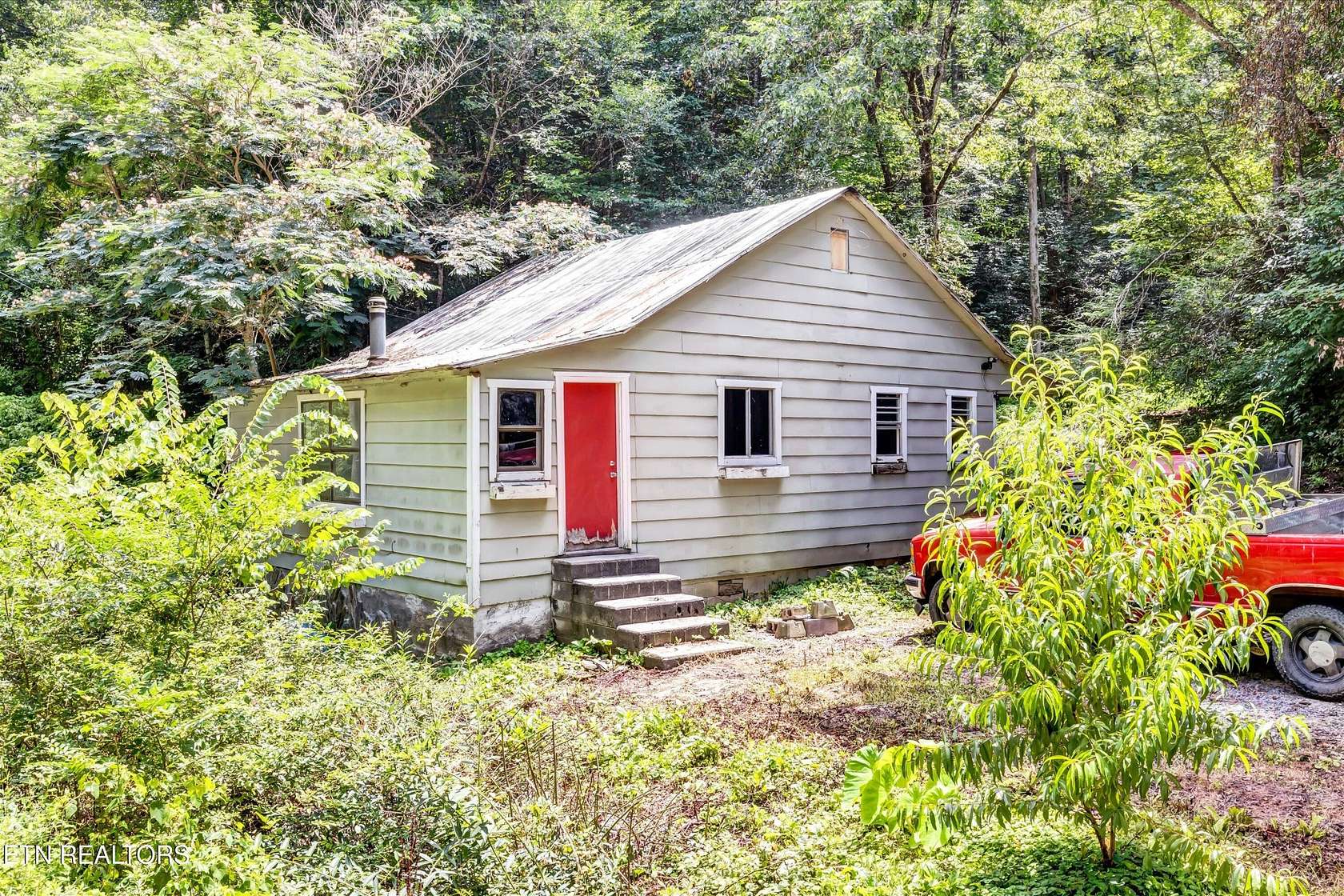 5.3 Acres of Residential Land with Home for Sale in Sevierville, Tennessee