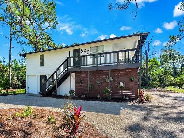 2.73 Acres of Residential Land with Home for Sale in Naples, Florida