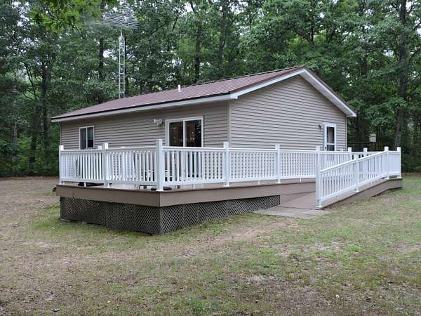 50 Acres of Recreational Land with Home for Sale in Bitely, Michigan