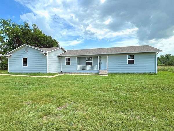 2 Acres of Residential Land with Home for Sale in Greenville, Texas